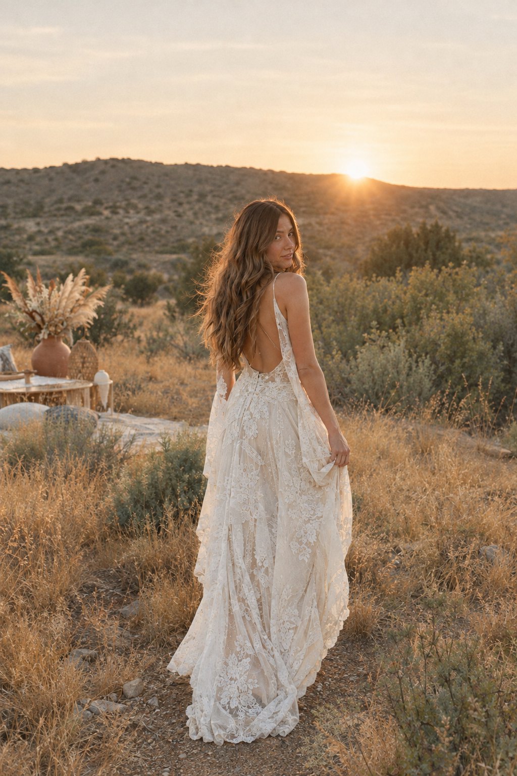 Boho bride in the desert at sunset in the Golden Boho Sundown look – after