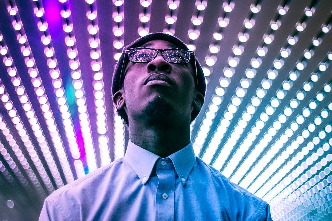 Night sky portrait edited with Brilliant Neon Lights preset – after